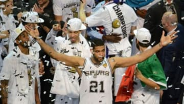Jun 15, 2014; San Antonio, TX, USA; San Antonio Spurs forward Tim Duncan (21) celebrates after defeating the Miami Heat in game five of the 2014 NBA Finals at AT&T Center. The Spurs defeated the Heat 104-87 to win the NBA Finals. Mandatory Credit: Brendan Maloney-USA TODAY Sports