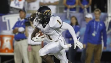 Sept 8, 2012; Lexington, KY, USA; Kent State Golden Flashes running back Dri Archer (1) runs the ball against the Kentucky Wildcats at Commonwealth Stadium. Credit: Mark Zerof-USA TODAY Sports