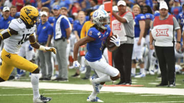 Kwamie Lassiter II of Kansas football in action against the West Virginia Mountaineer. (Photo by Ed Zurga/Getty Images)