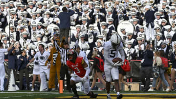 Nov 6, 2021; College Park, Maryland, USA; Penn State Nittany Lions wide receiver Jahan Dotson (5) celebrates catching a touchdown in front of Maryland Terrapins defensive back Nick Cross (3) during the game at Capital One Field at Maryland Stadium. Mandatory Credit: Tommy Gilligan-USA TODAY Sports