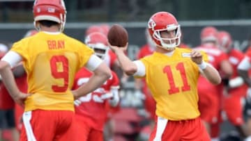 Jun 17, 2014; Kansas City, MO, USA; Kansas City Chiefs quarterback Alex Smith (11) throws passing drills during the Kansas City Chiefs minicamp at University of Kansas Hospital Training Complex. Mandatory Credit: Denny Medley-USA TODAY Sports