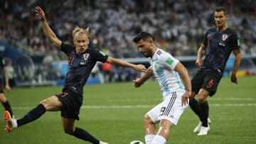 NIZHNIY NOVGOROD, RUSSIA - JUNE 21: Sergio Aguero of Argentina attempts to shoot past Domagoj Vida of Croatia during the 2018 FIFA World Cup Russia group D match between Argentina and Croatia at Nizhniy Novgorod Stadium on June 21, 2018 in Nizhniy Novgorod, Russia. (Photo by Clive Brunskill/Getty Images)
