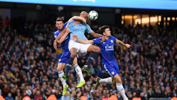 MANCHESTER, ENGLAND - MAY 06: Vincent Kompany of Manchester City battles for possession with Ben Chilwell of Leicester City and Harry Maguire of Leicester City during the Premier League match between Manchester City and Leicester City at Etihad Stadium on May 06, 2019 in Manchester, United Kingdom. (Photo by Laurence Griffiths/Getty Images)