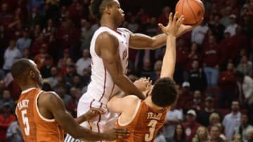 Feb 8, 2016; Norman, OK, USA; Oklahoma Sooners guard Buddy Hield (24) dribbles the ball as Texas Longhorns guard Javan Felix (3) defends during the second half at Lloyd Noble Center. Mandatory Credit: Mark D. Smith-USA TODAY Sports