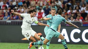 SINGAPORE - JULY 28: Hector Bellerin of Arsenal challenges Adrien Rabiot of Paris Saint Germain for the ball during the International Champions Cup match between Arsenal and Paris Saint Germain at the National Stadium on July 28, 2018 in Singapore. (Photo by Suhaimi Abdullah/Getty Images for ICC)