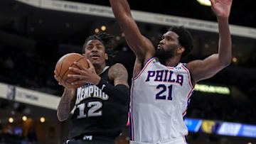 Ja Morant #12 of the Memphis Grizzlies Joel Embiid #21 of the Philadelphia 76ers-(Photo by Justin Ford/Getty Images)