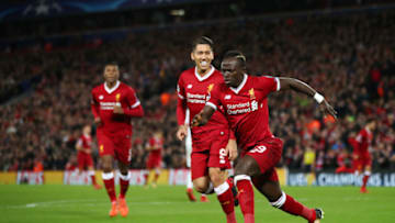 LIVERPOOL, ENGLAND - DECEMBER 06: Sadio Mane of Liverpool celebrates after scoring his sides fourth goal with Roberto Firmino of Liverpool during the UEFA Champions League group E match between Liverpool FC and Spartak Moskva at Anfield on December 6, 2017 in Liverpool, United Kingdom. (Photo by Clive Brunskill/Getty Images)