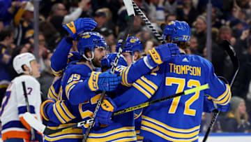 Jan 19, 2023; Buffalo, New York, USA; Buffalo Sabres right wing Alex Tuch (89) celebrates his goal with teammates during the second period against the New York Islanders at KeyBank Center. Mandatory Credit: Timothy T. Ludwig-USA TODAY Sports