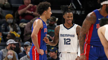 Detroit Pistons guard Cade Cunningham (left) and Memphis Grizzles guard Ja Morant (12)Credit: Petre Thomas-USA TODAY Sports
