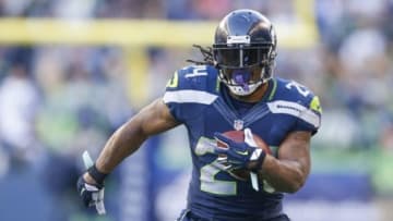 Nov 23, 2014; Seattle, WA, USA; Seattle Seahawks running back Marshawn Lynch (24) runs for yards after the catch against the Arizona Cardinals during the third quarter at CenturyLink Field. Mandatory Credit: Joe Nicholson-USA TODAY Sports