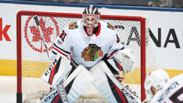 TORONTO, ON - OCTOBER 9: Anton Forsberg #31 of the Chicago Blackhawks gets set to face a shot during warm-up prior to playing against the Toronto Maple Leafs in an NHL game at the Air Canada Centre on October 9, 2017 in Toronto, Ontario. The Maple Leafs defeated the Blackhawks 4-3 in overtime (Photo by Claus Andersen/Getty Images)