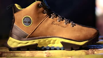 NEW YORK, NEW YORK - SEPTEMBER 22: Men's GreenStride™ Solar Ridge Waterproof Hikers are seen on display as Timberland Celebrates the Global launch of its FW21 GreenStride(™) Collection at the Bowery Subway Station in New York City on Wednesday, September 22, 2021. Timberland’s FW21 collection marks the first time GreenStride(™) eco-innovation is featured in the brand’s iconic boots. The release coincides with the launch of a global campaign celebrating changemakers from around the world who step outside every day and use their talents to move the world forward. (Photo by Dimitrios Kambouris/Getty Images for Timberland)