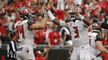 Sep 25, 2016; Tampa, FL, USA; Tampa Bay Buccaneers tight end Cameron Brate (84) is congratulated by quarterback Jameis Winston (3) after he scored a touchdown against the Los Angeles Rams during the second half at Raymond James Stadium. Mandatory Credit: Kim Klement-USA TODAY Sports