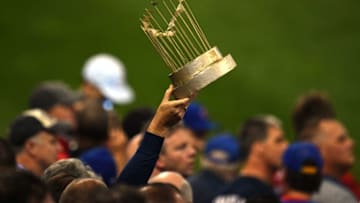 CLEVELAND, OH - NOVEMBER 02: A fan holds up a mock trophy during Game Seven of the 2016 World Series between the Chicago Cubs and the Cleveland Indians at Progressive Field on November 2, 2016 in Cleveland, Ohio. (Photo by Jason Miller/Getty Images)