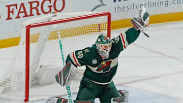 ST. PAUL, MN - DECEMBER 31: Devan Dubnyk #40 of the Minnesota Wild makes a glove save during a game with the Pittsburgh Penguins at Xcel Energy Center on December 31, 2018 in St. Paul, Minnesota.(Photo by Bruce Kluckhohn/NHLI via Getty Images)