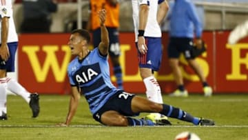 Jul 29, 2015; Denver, CO, USA; Tottenham Hotspur midfielder Dele Alli (20) reacts during the second half of the 2015 MLS All Star Game at Dick