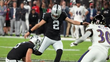 Auburn footballSep 13, 2021; Paradise, Nevada, USA; Las Vegas Raiders kicker Daniel Carlson (2) kicks a field goal against the Baltimore Ravens during the second half at Allegiant Stadium. Mandatory Credit: Kirby Lee-USA TODAY Sports