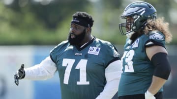 PHILADELPHIA, PENNSYLVANIA - AUGUST 17: Jason Peters #71 of the Philadelphia Eagles talks with Isaac Seumalo during training camp at NovaCare Complex on August 17, 2020 in Philadelphia, Pennsylvania. (Photo by Yong Kim-Pool/Getty Images)