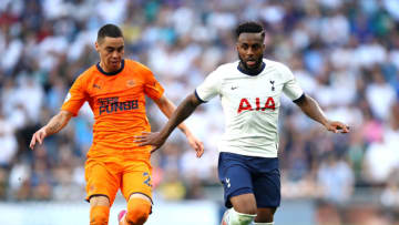 LONDON, ENGLAND - AUGUST 25: Danny Rose runs with the ball under pressure from Miguel Almiron of Newcastle United of Tottenham Hotspur during the Premier League match between Tottenham Hotspur and Newcastle United at Tottenham Hotspur Stadium on August 25, 2019 in London, United Kingdom. (Photo by Julian Finney/Getty Images)