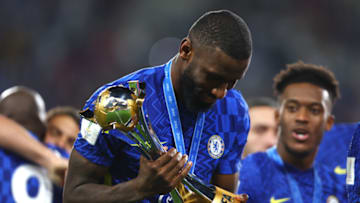 ABU DHABI, UNITED ARAB EMIRATES - FEBRUARY 12: Antonio Ruediger of Chelsea celebrates with The FIFA Club World Cup trophy following their side's victory during the FIFA Club World Cup UAE 2021 Final match between Chelsea and Palmeiras at Mohammed Bin Zayed Stadium on February 12, 2022 in Abu Dhabi, United Arab Emirates. (Photo by Francois Nel/Getty Images)
