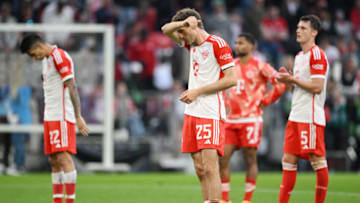 Bayern Munich players disappointed after defeat against RB Leipzig reduced their chances of retaining the Bundesliga title. (Photo by Matthias Hangst/Getty Images)