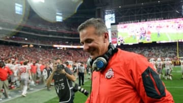 Jan 1, 2016; Glendale, AZ, USA; Ohio State Buckeyes head coach Urban Meyer smiles after being doused with Gatorade during the second half of the 2016 Fiesta Bowl against the Notre Dame Fighting Irish at University of Phoenix Stadium. Mandatory Credit: Joe Camporeale-USA TODAY Sports