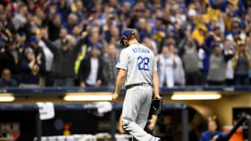 MILWAUKEE, WI - OCTOBER 12: Clayton Kershaw #22 of the Los Angeles Dodgers walks back to the dugout after being relieved by manager Dave Roberts #30 against the Milwaukee Brewers during the fourth inning in Game One of the National League Championship Series at Miller Park on October 12, 2018 in Milwaukee, Wisconsin. (Photo by Stacy Revere/Getty Images)