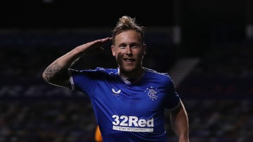 GLASGOW, SCOTLAND - OCTOBER 01: Scott Arfield of Rangers celebrates after scoring his team's first goal during the UEFA Europa League play-off match between Rangers and Galatasaray at Ibrox Stadium on October 01, 2020 in Glasgow, Scotland. Football Stadiums around Europe remain empty due to the Coronavirus Pandemic as Government social distancing laws prohibit fans inside venues resulting in fixtures being played behind closed doors. (Photo by Ian MacNicol/Getty Images)