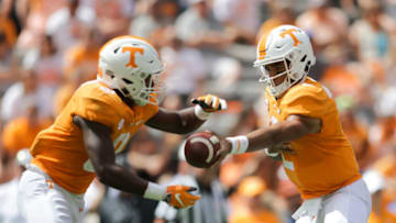 KNOXVILLE, TN - SEPTEMBER 15: Quarterback Jarrett Guarantano #2 of the Tennessee Volunteers hands the ball off to Running back Tim Jordan #9 of the Tennessee Volunteers during the second half of the game between the UTEP Miners and Tennessee Volunteers at Neyland Stadium on September 15, 2018 in Knoxville, Tennessee. Tennessee won the game 24-0. (Photo by Donald Page/Getty Images)