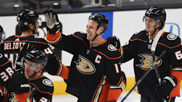 ANAHEIM, CA - NOVEMBER 01: Anaheim Ducks center Ryan Getzlaf (15) celebrates on the ice with teammates after Getzlaf scored the game winning goal in overtime to defeat the Vancouver Canucks 2 to 1 in a game played on November 1, 2019 at the Honda center in Anaheim, CA. (Photo by John Cordes/Icon Sportswire via Getty Images)