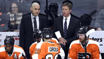 Jan 19, 2016; Philadelphia, PA, USA; Philadelphia Flyers assistant head coach Ian Laperriere (left) and head coach Dave Hakstol against the Toronto Maple Leafs during the third period at Wells Fargo Center. The Maple Leafs defeated the Flyers, 3-2. Mandatory Credit: Eric Hartline-USA TODAY Sports