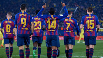 VILLAREAL, SPAIN - APRIL 02: Malcom Filipe Silva de Oliveira (C) of FC Barcelona celebrates his sides second goal with his teammates during the La Liga match between Villarreal CF and FC Barcelona at Estadio de la Ceramica on April 2, 2019 in Villareal, Spain. (Photo by David Aliaga/MB Media/Getty Images)