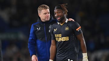 LEEDS, ENGLAND - JANUARY 22: Eddie Howe embraces Allan Saint-Maximin of Newcastle United after their sides victory during the Premier League match between Leeds United and Newcastle United at Elland Road on January 22, 2022 in Leeds, England. (Photo by Stu Forster/Getty Images)