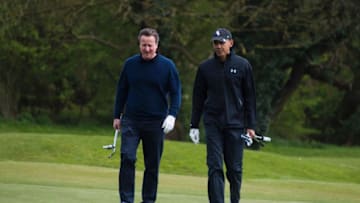 US President Barack Obama (R) talks with British Prime Minister David Cameron (L) as they walk onto the 3rd green at The Grove Golf Course near Watford in Hertfordshire, north of London, on April 23, 2016. / AFP / Jim Watson (Photo credit should read JIM WATSON/AFP/Getty Images)