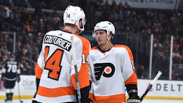 LOS ANGELES, CA - NOVEMBER 1: Sean Couturier #14 and Travis Konecny #11 of the Philadelphia Flyers talk during the second period of the game against the Los Angeles Kings at STAPLES Center on November 1, 2018 in Los Angeles, California. (Photo by Adam Pantozzi/NHLI via Getty Images)