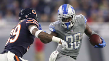 DETROIT, MI - DECEMBER 16: Tion Green #38 of the Detroit Lions runs the ball against Eddie Jackson #39 of the Chicago Bears during the first half at Ford Field on December 16, 2017 in Detroit, Michigan. (Photo by Leon Halip/Getty Images)