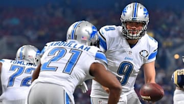 Dec 13, 2015; St. Louis, MO, USA; Detroit Lions quarterback Matthew Stafford (9) hands the ball off to Detroit Lions running back Ameer Abdullah (21) against the St. Louis Rams during the first half at the Edward Jones Dome. Mandatory Credit: Jasen Vinlove-USA TODAY Sports