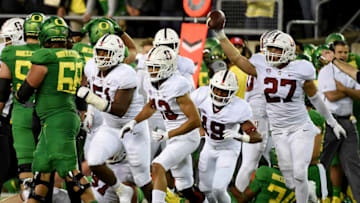 EUGENE, OR - SEPTEMBER 22: Linebacker Sean Barton (27) of the Stanford Cardinal runs off the field with a fumble recovery in the fourth quarter of the game against the Oregon Ducks at Autzen Stadium on September 22, 2018 in Eugene, Oregon. Stanford won the game in overtime 38-31. (Photo by Steve Dykes/Getty Images)