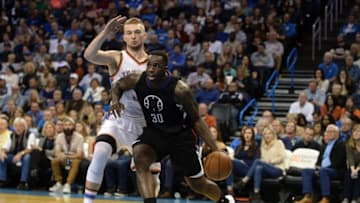 Dec 31, 2016; Oklahoma City, OK, USA; LA Clippers forward Brandon Bass (30) drives to the basket in front of Oklahoma City Thunder forward Domantas Sabonis (3) during the second quarter at Chesapeake Energy Arena. Mandatory Credit: Mark D. Smith-USA TODAY Sports