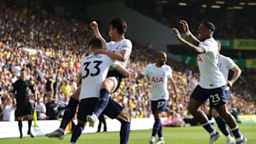 NORWICH, ENGLAND - MAY 22: Son Heung-Min of Tottenham Hotspur celebrates with team mate Ben Davies after scoring their fifth goal during the Premier League match between Norwich City and Tottenham Hotspur at Carrow Road on May 22, 2022 in Norwich, England. (Photo by David Rogers/Getty Images)