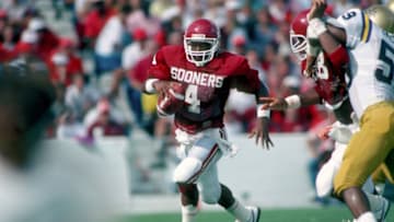Sep 1986; Norman, OK, USA; FILE PHOTO; Oklahoma Sooners quarterback #4 Jamelle Holieway in action against UCLA during the 1986 season. Mandatory Credit: Photo By Malcolm Emmons-USA TODAY Sports Copyright (c) Malcolm Emmons