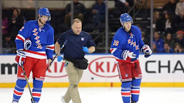 Apr 7, 2016; New York, NY, USA; New York Rangers right wing Jesper Fast (19) skates off the ice after sustaining an injury against the New York Islanders during the third period at Madison Square Garden. The Islanders won 4-1. Mandatory Credit: Brad Penner-USA TODAY Sports