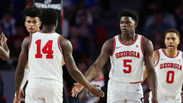 Anthony Edwards high fives teammates. (Photo by Carmen Mandato/Getty Images)