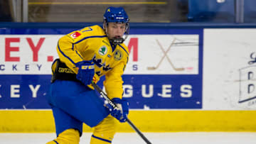 PLYMOUTH, MI - FEBRUARY 15: Jonatan Berggren #17 of the Sweden Nationals skates up ice with the puck against the Finland Nationals during the 2018 Under-18 Five Nations Tournament game at USA Hockey Arena on February 15, 2018 in Plymouth, Michigan. Finland defeated Sweden 5-3. (Photo by Dave Reginek/Getty Images)*** Local Caption *** Jonatan Berggren