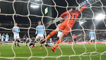 NEWCASTLE UPON TYNE, ENGLAND - JANUARY 29: Newcastle forward Salomon Rondon (floor) scores the first Newcastle goal during the Premier League match between Newcastle United and Manchester City at St. James Park on January 29, 2019 in Newcastle upon Tyne, United Kingdom. (Photo by Stu Forster/Getty Images)