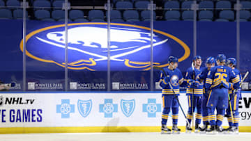 Jan 31, 2021; Buffalo, New York, USA; Buffalo Sabres defenseman Rasmus Ristolainen (55) celebrates his goal with teammates during the third period against the New Jersey Devils at KeyBank Center. Mandatory Credit: Timothy T. Ludwig-USA TODAY Sports
