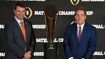 Jan 8, 2017; Tampa, FL, USA; Clemson Tigers head coach Dabo Swinney and Alabama Crimson Tide head coach Nick Saban pose for photos with the trophy during the head coaches news conference at the Tampa Convention Center. Mandatory Credit: John David Mercer-USA TODAY Sports
