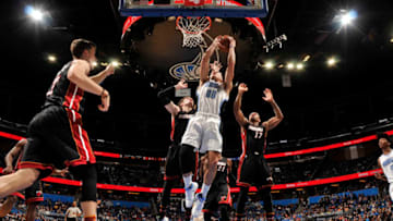 ORLANDO, FL - MARCH 3: Aaron Gordon #00 of the Orlando Magic grabs the rebound against the Miami Heat on March 3, 2017 at the Amway Center in Orlando, Florida. NOTE TO USER: User expressly acknowledges and agrees that, by downloading and or using this Photograph, user is consenting to the terms and conditions of the Getty Images License Agreement. Mandatory Copyright Notice: Copyright 2017 NBAE (Photo by Fernando Medina/NBAE via Getty Images)