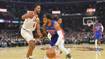 Saddiq Bey #41 of the Detroit Pistons drives to the basket around Evan Mobley #4 of the Cleveland Cavaliers (Photo by Jason Miller/Getty Images)