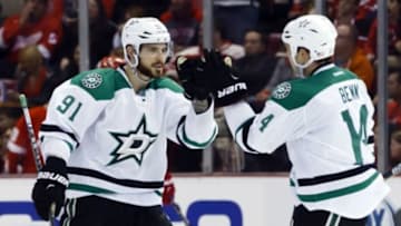 Nov 8, 2015; Detroit, MI, USA; Dallas Stars center Tyler Seguin (91) receives congratulations from left wing Jamie Benn (14) after scoring in the third period against the Detroit Red Wings at Joe Louis Arena. Dallas won 4-1. Mandatory Credit: Rick Osentoski-USA TODAY Sports
